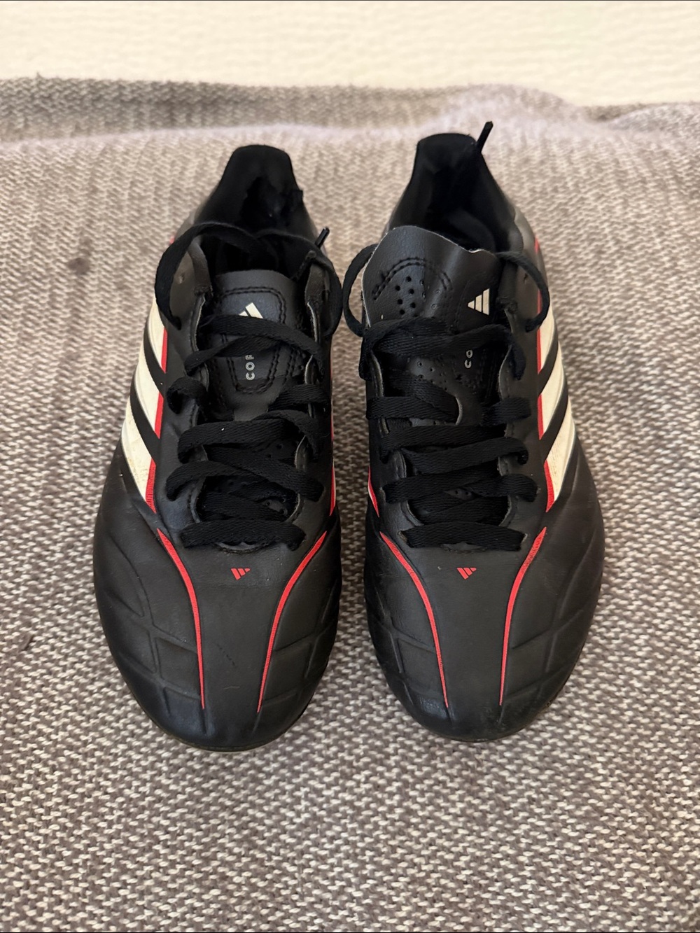 adidas kid’s Black, White & Red Soccer Cleats